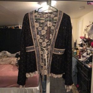 Lace sweater the size is L but runs small